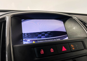 Подержанный автомобиль Opel Astra Wagon 2014 года (14 фото)