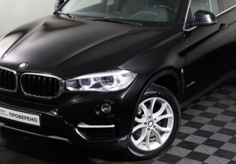 Подержанный автомобиль BMW X6 2015 года (26 фото)