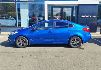 Подержанный автомобиль Kia Cerato Sedan 2013 года (8 фото)