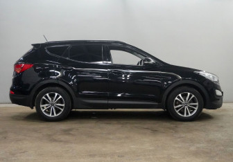 Подержанный автомобиль Hyundai Santa Fe 2015 года (4 фото)