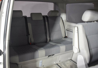 Подержанный автомобиль Volkswagen Multivan 2015 года (11 фото)