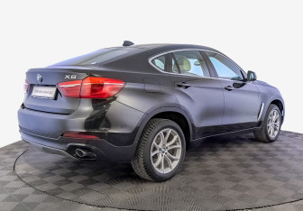 Подержанный автомобиль BMW X6 2015 года (5 фото)