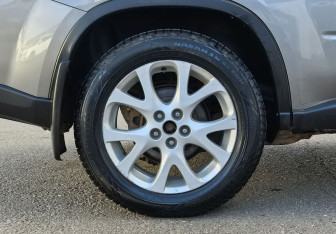 Подержанный автомобиль Nissan X-Trail 2011 года (10 фото)