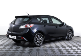 Подержанный автомобиль Mazda 3 Hatchback 2009 года (5 фото)