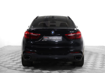 Подержанный автомобиль BMW X6 2015 года (6 фото)