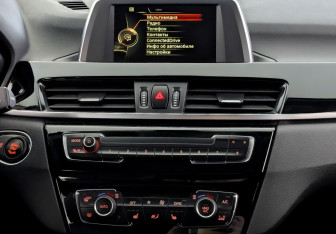 Подержанный автомобиль BMW X1 2016 года (15 фото)