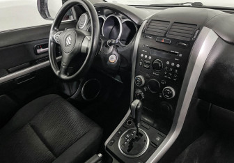 Подержанный автомобиль Suzuki Grand Vitara 2013 года (9 фото)