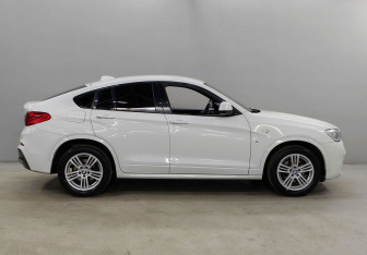 Подержанный автомобиль BMW X4 2016 года (4 фото)