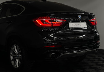 Подержанный автомобиль BMW X6 2016 года (19 фото)