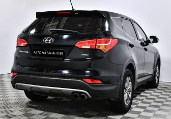 Подержанный автомобиль Hyundai Santa Fe 2014 года (3 фото)