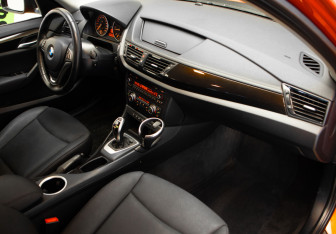 Подержанный автомобиль BMW X1 2012 года (29 фото)
