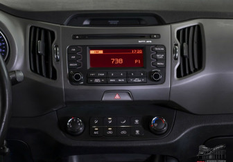 Подержанный автомобиль Kia Sportage 2014 года (11 фото)