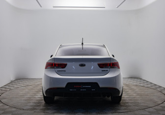 Подержанный автомобиль Kia Cerato Coupe 2012 года (6 фото)