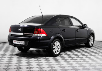 Подержанный автомобиль Opel Astra Sedan 2011 года (5 фото)