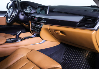 Подержанный автомобиль BMW X6 2016 года (10 фото)
