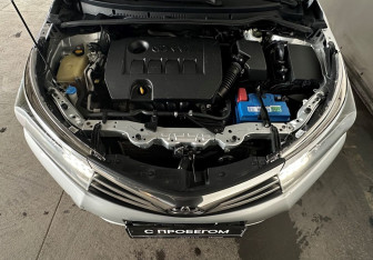 Подержанный автомобиль Toyota Corolla Sedan 2013 года (9 фото)