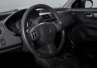Подержанный автомобиль Suzuki Swift Hatchback 2008 года (13 фото)