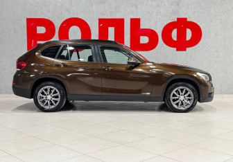 Подержанный автомобиль BMW X1 2013 года (4 фото)
