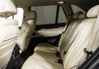 Подержанный автомобиль BMW X5 2014 года (13 фото)