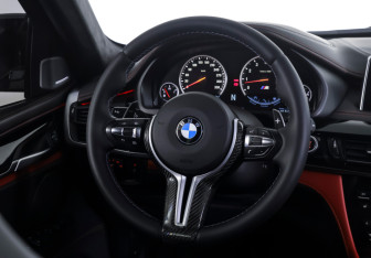 Подержанный автомобиль BMW X6 M 2017 года (14 фото)