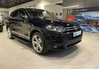 Подержанный автомобиль Volkswagen Touareg 2014 года (3 фото)