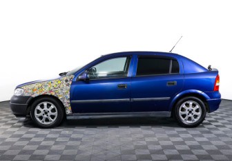 Подержанный автомобиль Opel Astra Hatchback 2004 года (8 фото)