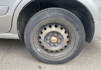 Подержанный автомобиль Nissan Almera Classic 2008 года (12 фото)