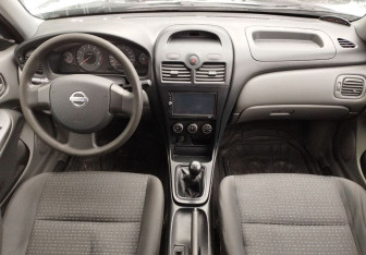 Подержанный автомобиль Nissan Almera Classic 2008 года (9 фото)