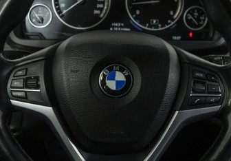 Подержанный автомобиль BMW X5 2014 года (12 фото)