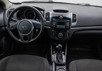 Подержанный автомобиль Kia Cerato Coupe 2012 года (13 фото)