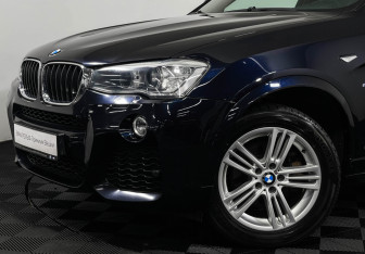 Подержанный автомобиль BMW X4 2017 года (19 фото)