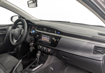 Подержанный автомобиль Toyota Corolla Sedan 2014 года (13 фото)