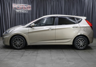 Подержанный автомобиль Hyundai Solaris Hatchback 2013 года (8 фото)