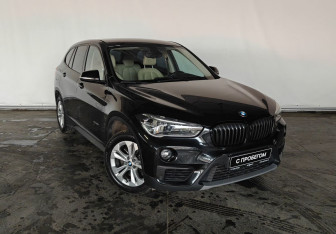 Подержанный автомобиль BMW X1 2015 года (3 фото)