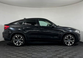 Подержанный автомобиль BMW X6 2016 года (6 фото)