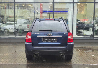 Подержанный автомобиль Kia Sportage 2010 года (7 фото)
