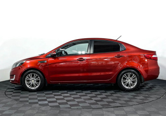 Подержанный автомобиль Kia Rio Sedan 2012 года (8 фото)