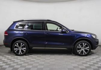 Подержанный автомобиль Volkswagen Touareg 2014 года (4 фото)