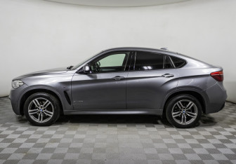 Подержанный автомобиль BMW X6 2018 года (8 фото)