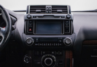Подержанный автомобиль Toyota Land Cruiser Prado 2014 года (14 фото)