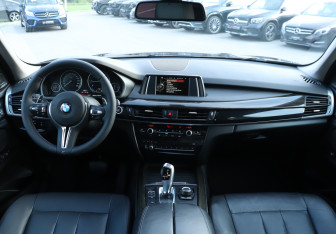 Подержанный автомобиль BMW X5 2014 года (12 фото)