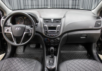 Подержанный автомобиль Hyundai Solaris Sedan 2015 года (14 фото)