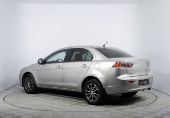 Подержанный автомобиль Mitsubishi Lancer Sedan 2012 года (7 фото)