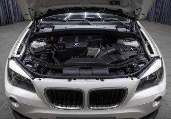 Подержанный автомобиль BMW X1 2013 года (9 фото)