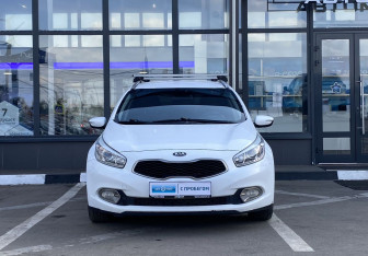 Подержанный автомобиль Kia Ceed Wagon 2014 года (2 фото)