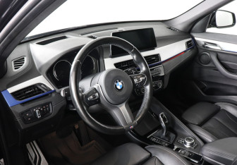Подержанный автомобиль BMW X1 2022 года (11 фото)