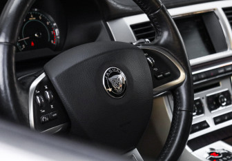 Подержанный автомобиль Jaguar XF Sedan 2014 года (37 фото)