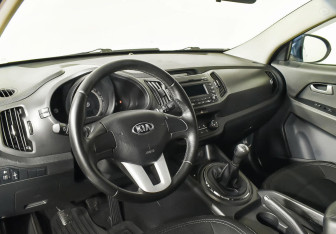 Подержанный автомобиль Kia Sportage 2013 года (10 фото)