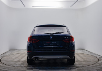 Подержанный автомобиль BMW X1 2014 года (6 фото)