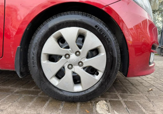 Подержанный автомобиль Kia Rio Sedan 2015 года (13 фото)